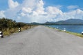 Driving on an empty road. Empty asphalt road through the green field and clouds on blue sky in summer day. Open road ahead, endles Royalty Free Stock Photo