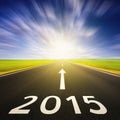 Driving on an empty road in speed to 2015 Royalty Free Stock Photo