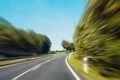 Driving fast concept - motion blur on rural highway