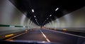 Driving fast in a tunnel on the highway Royalty Free Stock Photo