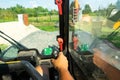 Driving a forklift. The cab of the truck through the eyes of the operator. The job of a forklift on a construction site. Royalty Free Stock Photo