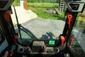 Driving a forklift. The cab of the truck through the eyes of the operator. The job of a forklift on a construction site. Royalty Free Stock Photo