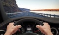 Driving hands steering wheel Royalty Free Stock Photo