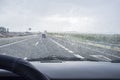 Driving on a highway in the rain Royalty Free Stock Photo