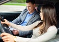 Driving instructor and woman student Royalty Free Stock Photo