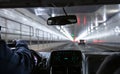 Driving in Lincoln tunnel, New York. Close up view on cab driver hand and dashboard