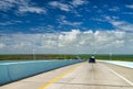 Driving machine at speed over the bridge across the Keys. The atmosphere of travel. USA. Florida. Road to Key West Royalty Free Stock Photo