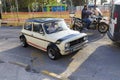 Driving a Mini Club man on the street of Athens city