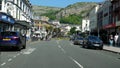 Driving Mostyn Street in Llandudno town in Wales