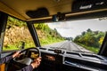 Driving motorhome or campervan on the road outdoors in nature