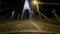 Driving at night, highway bridge