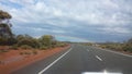 Driving the Nullabor on a highway in the Australian Outback