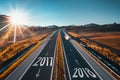 Driving on open road at beautiful sunny day to new year 2018 Royalty Free Stock Photo