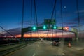 Driving over a bridge early morning at sunriseac