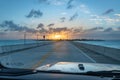 Driving the Overseas highway in the florida keys at sunset Royalty Free Stock Photo
