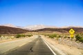 Driving through Panamint Valley on a winding road; Mojave Desert, California Royalty Free Stock Photo