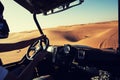 Driving quad baggi bike at desert dunes