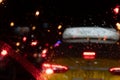 Driving in rain reflections of headlights of a car in the evening management of a car in a rain view of a taxi Royalty Free Stock Photo