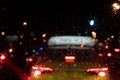 Driving in rain reflections of headlights of a car in the evening management of a car in a rain view of a taxi Royalty Free Stock Photo