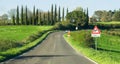 Driving road bends road sign that indicates the curve