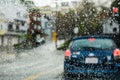 Driving through San Francisco on a rainy day; rain drops on the windshield; California Royalty Free Stock Photo