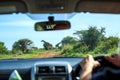 Driving through savanna and watching giraffes