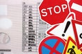 Driving school concept. Road signs on driver license Royalty Free Stock Photo