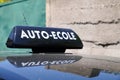 Driving school means auto ecole text sign in french write on education learning car roof Royalty Free Stock Photo