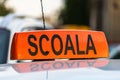 Driving school scoala sign, romanian driving school car sign Royalty Free Stock Photo