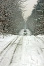 Driving in the snow on a countryroad Royalty Free Stock Photo