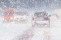 Driving in snow storm on bad winter Road Royalty Free Stock Photo