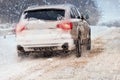 Driving in snow storm on bad winter Road Royalty Free Stock Photo