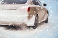 Driving in snow storm on bad winter Road Royalty Free Stock Photo