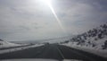 Driving into and snowy freeway Utah