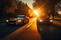 Driving a sport car with the sun directly behind them in a picturesque halo effect, backlighting their carefree joyride.
