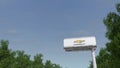 Driving towards advertising billboard with Chevrolet logo. Editorial 3D rendering