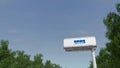 Driving towards advertising billboard with KPMG logo. Editorial 3D rendering