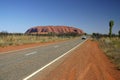 Driving beside Uluru