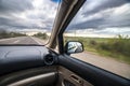 Driving under stormy sky Royalty Free Stock Photo