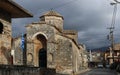 Driving under stormy sky in Kalamata Greece past historic church of the Holy Apostles Kalamata Greece,where the revolution against