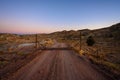 Driving Up to Cattle Guard On Dirt Road Royalty Free Stock Photo