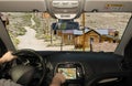 Driving while using navigation system in Bodie, California, USA