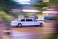 Driving white stretch limousine Royalty Free Stock Photo