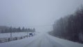 Driving Whiteout Snow Weather on Dangerous Road Conditions in Winter. Driver Point of View POV Blizzard Snow Storm White-Out