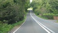 Driving on winding A456 road in the forest