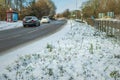 Driving on winter snow road in town in england uk during covid lockdown Royalty Free Stock Photo