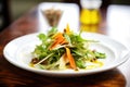 drizzled vinaigrette over roasted squash, mixed lettuce, pine nuts, shaved carrots