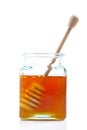 Drizzler inside of honey jar Royalty Free Stock Photo