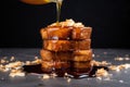 drizzling maple syrup on french toast stack Royalty Free Stock Photo