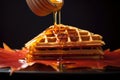 drizzling maple syrup on a fresh waffle